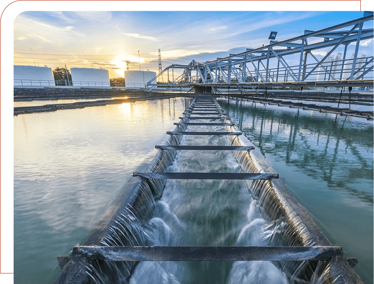 A large water plant with pipes running through it.